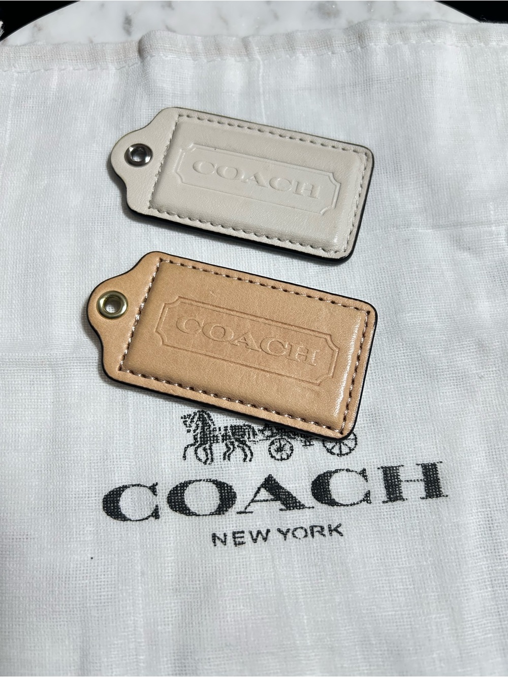 Coach Leather Bag Tags in Cream and Tan